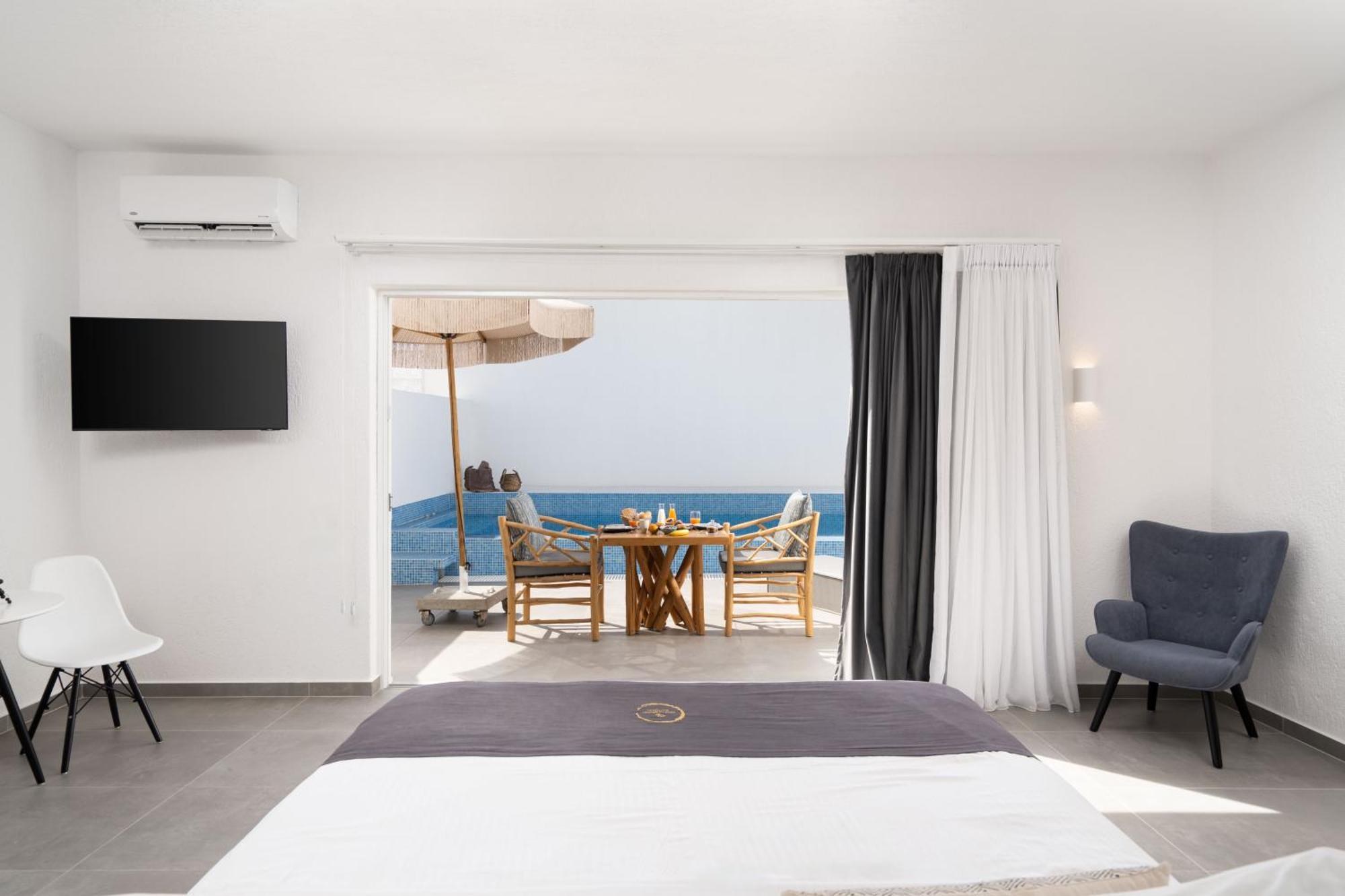 Aegean Melody Suites & Villas Vlychada Exterior photo